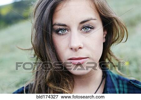Close up of mixed race woman outdoors View Large Photo Image Stock Photo - Close up of mixed race woman outdoors. Fotosearch