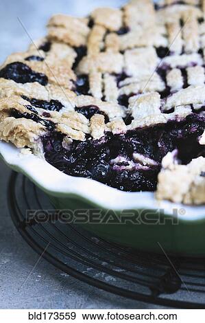 Close up of sliced blueberry pie View Large Photo Image Stock Photo - Close up of sliced blueberry pie. Fotosearch