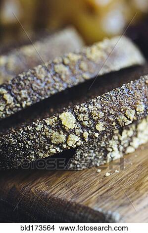 Close up of sliced bread on board View Large Photo Image Picture - Close up of sliced bread on board. Fotosearch