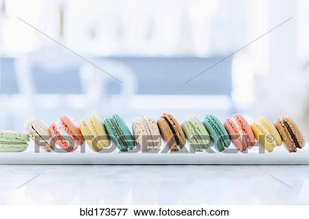Stock Photo - Close up of variety of macaroon cookies. Fotosearch