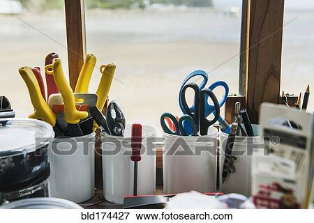 Craft tools in windowsill View Large Photo Image Stock Photo - Craft tools in windowsill. Fotosearch