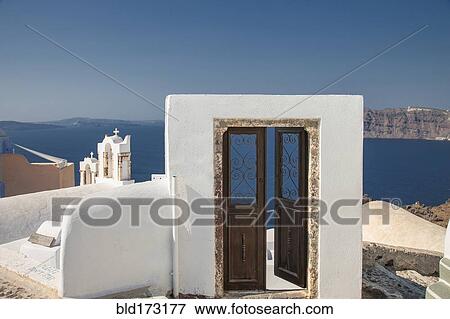 Door on hilltop over seascape View Large Photo Image Stock Photo - Door on hilltop over seascape. Fotosearch