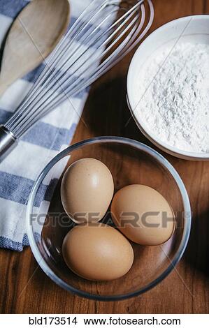 Eggs, flour and baking tools View Large Photo Image Picture - Eggs, flour and baking tools. Fotosearch
