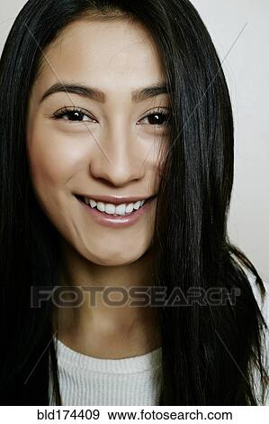 Hispanic woman smiling View Large Photo Image Stock Photo - Hispanic woman smiling. Fotosearch