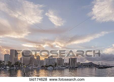 Honolulu city skyline over ocean, Hawaii, United States View Large Photo Image Stock Photo - Honolulu city skyline over ocean, Hawaii, United States. Fotosearch