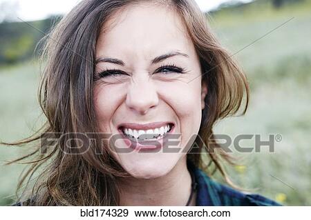 Mixed race woman smiling outdoors View Large Photo Image Stock Photo - Mixed race woman smiling outdoors. Fotosearch