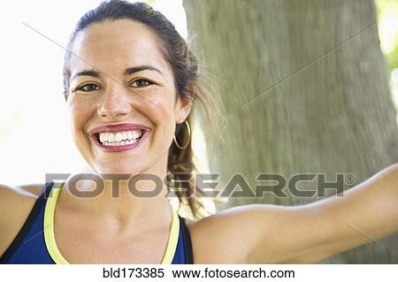 Mixed race woman smiling outdoors View Large Photo Image Stock Photography - Mixed race woman smiling outdoors. Fotosearch