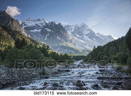 Mont Blanc over remote stream, Courmayeur, Italy View Large Photo Image Stock Photography - Mont Blanc over remote stream, Courmayeur, Italy. Fotosearch