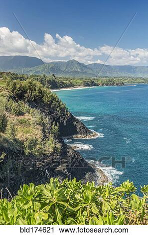 Stock Image - Mountains on coastline, Hawaii, United States. Fotosearch