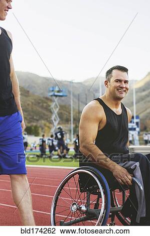 Paraplegic athlete in wheelchair and friend on track View Large Photo Image Stock Image - Paraplegic athlete in wheelchair and friend on track. Fotosearch