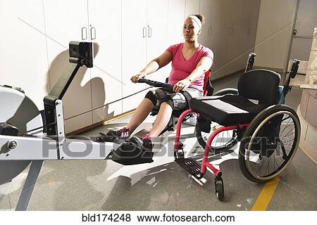 Paraplegic woman working out in physical therapy View Large Photo Image Stock Photo - Paraplegic woman working out in physical therapy. Fotosearch