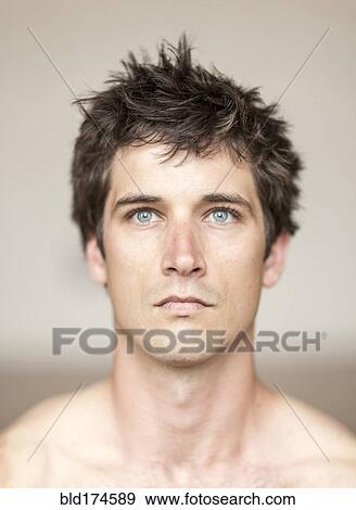 Stock Photo - Serious man with messy hair. Fotosearch