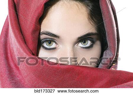 Stock Photo - Woman peering over veil. Fotosearch