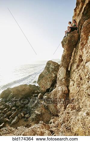 Women climbing rock formation View Large Photo Image Picture - Women climbing rock formation. Fotosearch