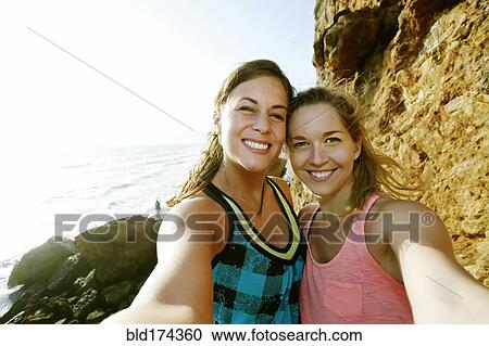 Women taking selfie outdoors View Large Photo Image Stock Image - Women taking selfie outdoors. Fotosearch
