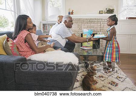 African American family celebrating birthday View Large Photo Image Stock Photo - African American family celebrating birthday. Fotosearch