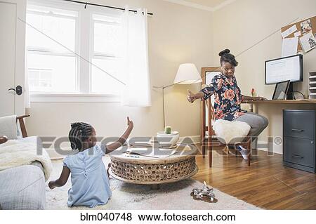 African American mother and daughter gesturing thumbs up View Large Photo Image Stock Photo - African American mother and daughter gesturing thumbs up. Fotosearch