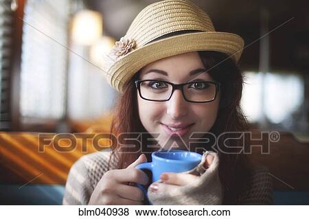 Caucasian woman drinking coffee View Large Photo Image Stock Photo - Caucasian woman drinking coffee. Fotosearch