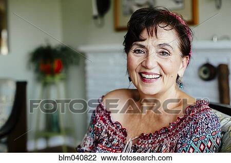 Caucasian woman smiling indoors View Large Photo Image Stock Image - Caucasian woman smiling indoors. Fotosearch