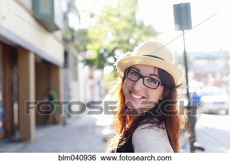 Stock Photograph - Caucasian woman smiling outdoors. Fotosearch