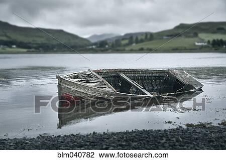 Dilapidated boat in rural lake View Large Photo Image Stock Image - Dilapidated boat in rural lake. Fotosearch