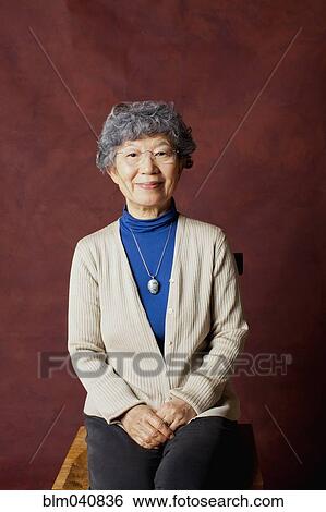 Stock Photograph - Older Japanese woman smiling. Fotosearch