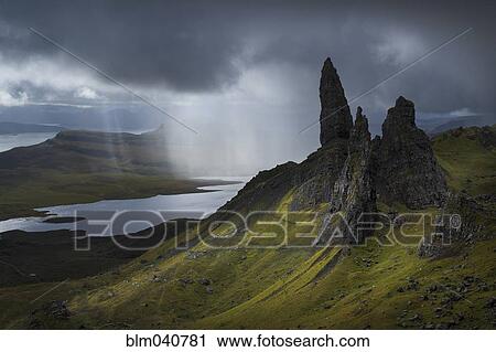 Stock Image - Rock formations in rural landscape. Fotosearch