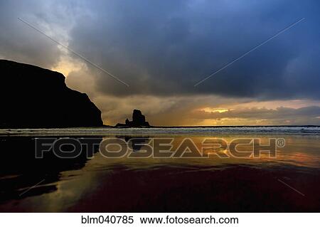 Storm clouds over waves on beach View Large Photo Image Stock Photography - Storm clouds over waves on beach. Fotosearch