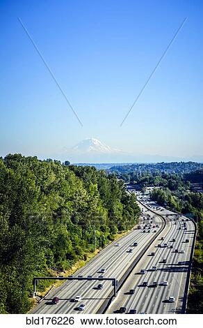 Aerial view of Mount Rainier and freeway, Seattle, Washington, United States View Large Photo Image Stock Photograph - Aerial view of Mount Rainier and freeway, Seattle, Washington, United States. Fotosearch