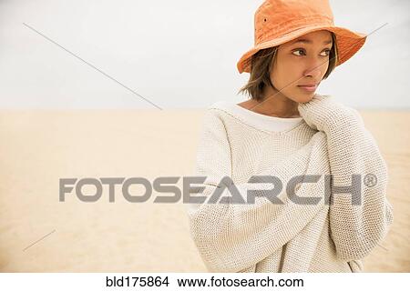 Picture - African American woman at beach. Fotosearch