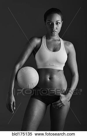 African American woman holding volleyball View Large Photo Image Stock Photography - African American woman holding volleyball. Fotosearch