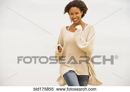 African American woman walking outdoors View Large Photo Image Stock Photography - African American woman walking outdoors. Fotosearch