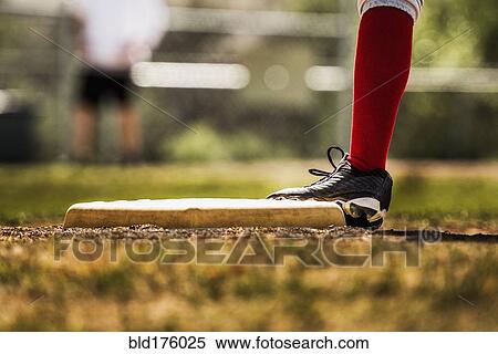 Baseball player touching base View Large Photo Image Stock Photography - Baseball player touching base. Fotosearch