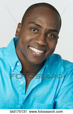 Stock Image - Black man smiling. Fotosearch