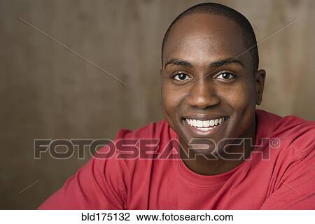 Black man smiling View Large Photo Image Stock Image - Black man smiling. Fotosearch