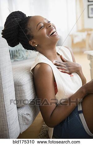 Stock Image - Black woman laughing. Fotosearch