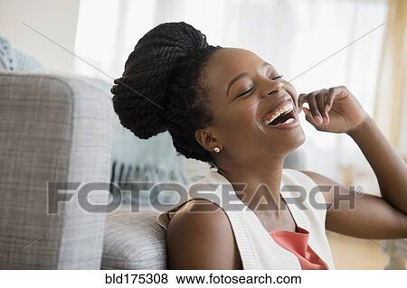 Stock Photo - Black woman laughing. Fotosearch