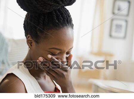 Stock Photo - Black woman laughing. Fotosearch