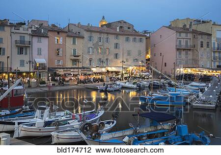 Boats docked in St Tropez marina, Provence, France View Large Photo Image Stock Image - Boats docked in St Tropez marina, Provence, France. Fotosearch