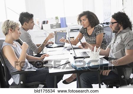 Business people talking in meeting View Large Photo Image Picture - Business people talking in meeting. Fotosearch