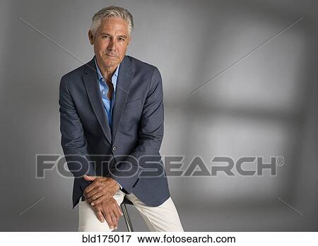 Stock Photo - Caucasian businessman smiling. Fotosearch