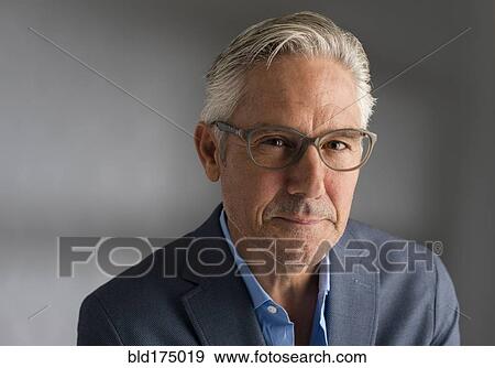 Stock Photo - Caucasian businessman smiling. Fotosearch