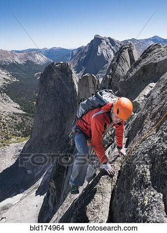 Caucasian climber on mountainside View Large Photo Image Picture - Caucasian climber on mountainside. Fotosearch
