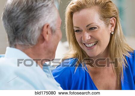 Caucasian couple laughing View Large Photo Image Stock Image - Caucasian couple laughing. Fotosearch