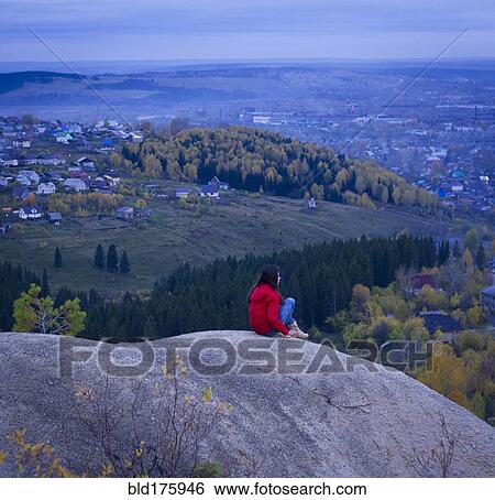 Stock Photograph - Caucasian girl admiring scenic view. Fotosearch