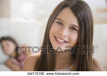 Stock Image - Caucasian girl smiling. Fotosearch