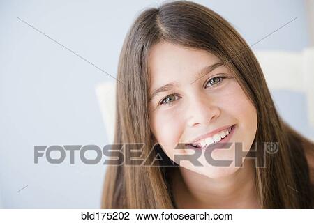 Stock Image - Caucasian girl smiling. Fotosearch