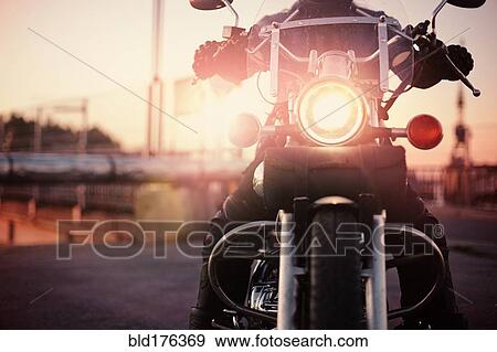 Caucasian man riding motorcycle View Large Photo Image Stock Photo - Caucasian man riding motorcycle. Fotosearch
