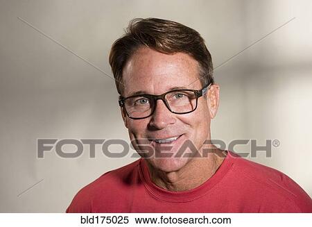 Caucasian man wearing eyeglasses View Large Photo Image Stock Photography - Caucasian man wearing eyeglasses. Fotosearch
