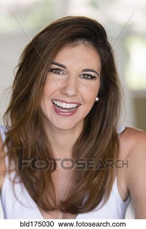 Stock Image - Caucasian woman smiling. Fotosearch